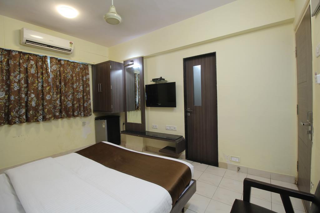 Hotel Samrat Bombaim Quarto foto