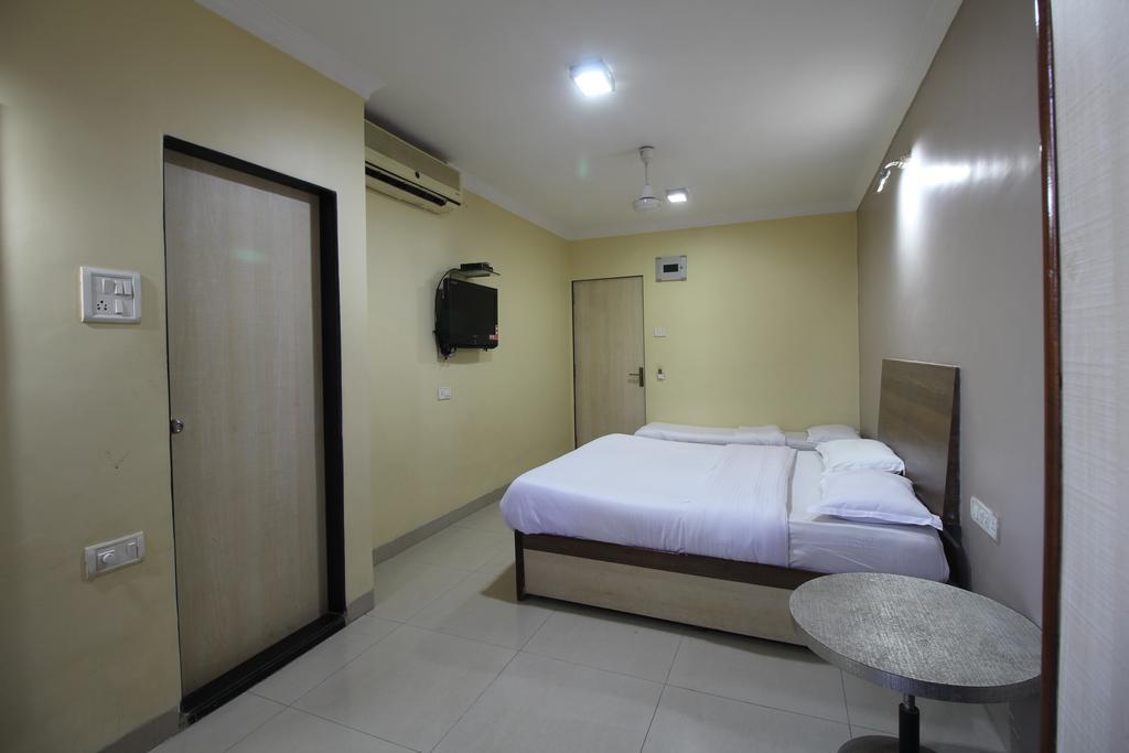 Hotel Samrat Bombaim Quarto foto