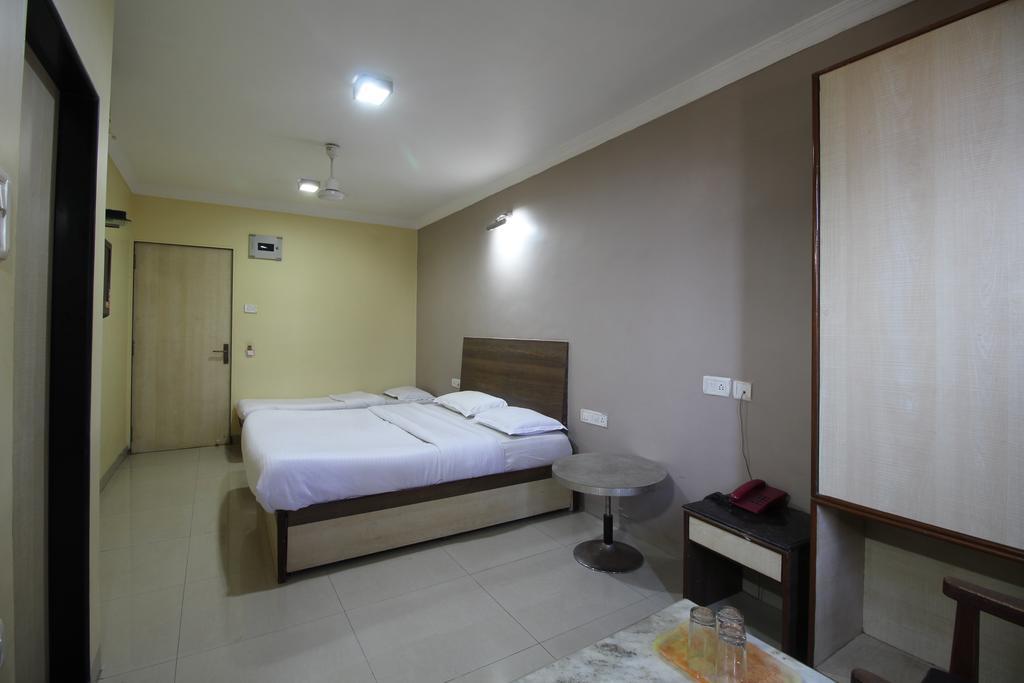 Hotel Samrat Bombaim Quarto foto